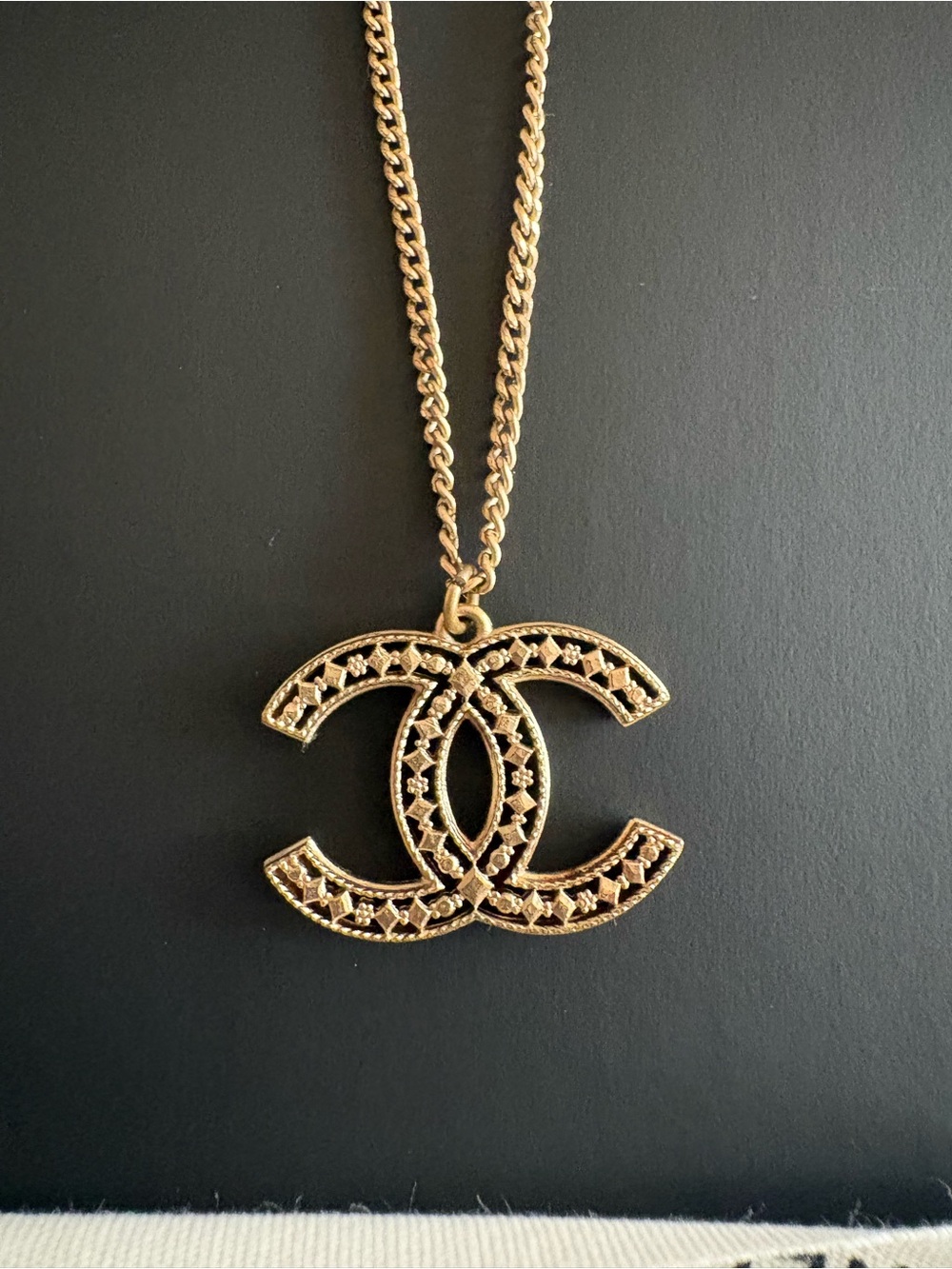 CHANEL Gold-Tone Interlaced CC Pendant Necklace